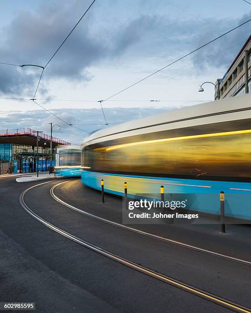 trams in city - göteborg stock pictures, royalty-free photos & images