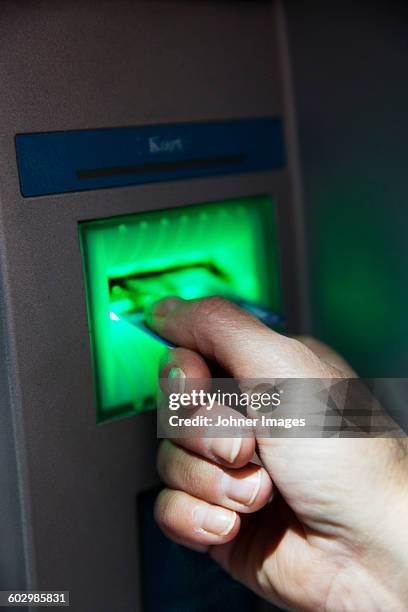 75 Putting Money Into Machine Stock Photos, High-Res Pictures, and ...