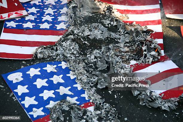 Student group League of Filipino Students trooped to the U.S. Embassy in Roxas Boulevard in Manila, Sunday afternoon. The group burned a mock U.S....