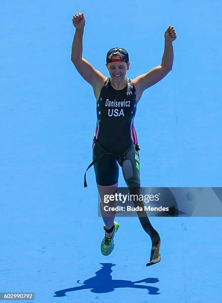 Hailey Danisewicz of the United States celebrates winning the silver medal in the Triathlon Women's T2 at Forte de Copacabana on day 4 of the Rio...