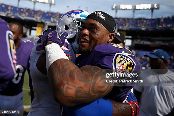 Wide receiver Steve Smith of the Baltimore Ravens hugs a Buffalo Bills player after the Buffalo Bills vs. The Baltimore Ravens game at M&T Bank...