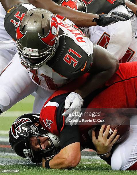 Kwon Alexander and Robert Ayers of the Tampa Bay Buccaneers sack Matt Ryan of the Atlanta Falcons at Georgia Dome on September 11, 2016 in Atlanta,...