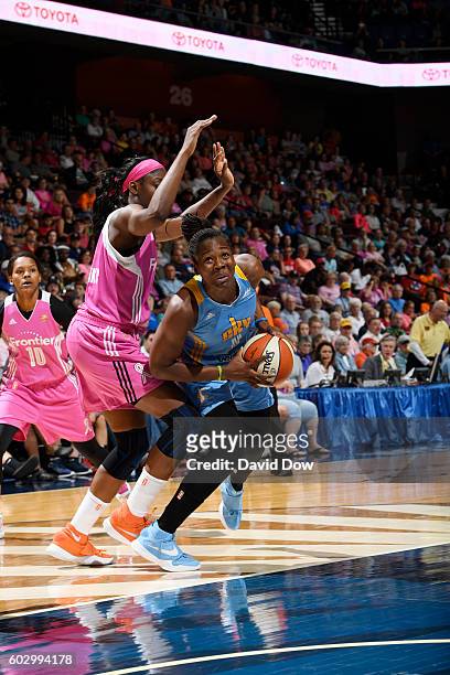 Clarissa dos Santos of the Chicago Sky handles the ball against the Connecticut Sun on September 11, 2016 at the Mohegan Sun Arena in Uncasville,...