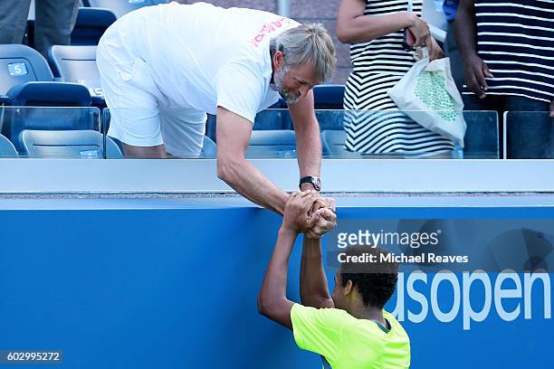 Felix Auger-Aliassime of Canada celebrates after defeating Miomir Kecmanovic of Serbia in their Junior Boys' Singles Final Match on Day Fourteen of...
