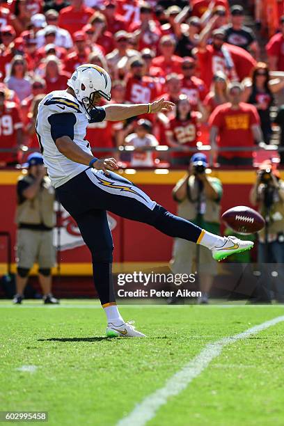 Punter Drew Kaser of the San Diego Chargers makes a very short punt in the fourth quarter against the Kansas City Chiefs that gave them great field...