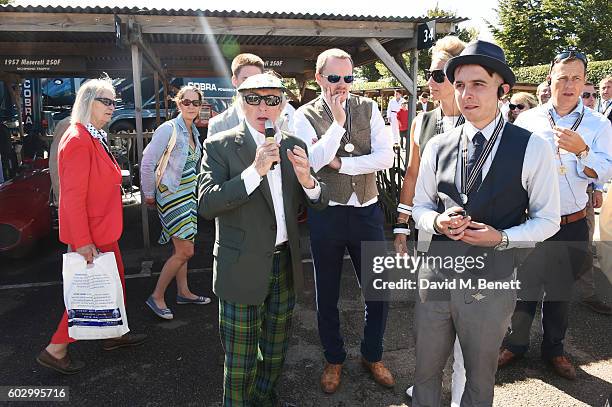 Sir Jackie Stewart speaks at day 3 of the Goodwood Revival at Goodwood on September 11, 2016 in Chichester, England.