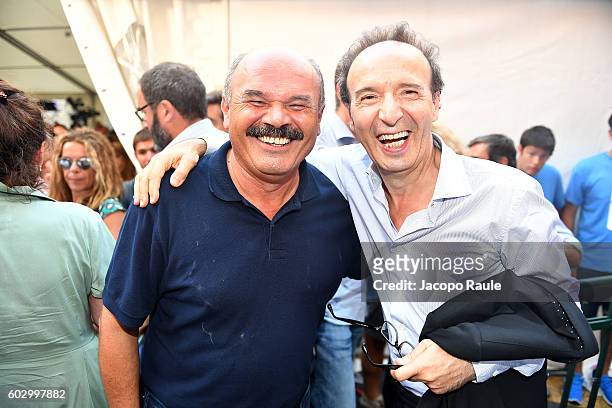 Roberto Benigni and Oscar Farinetti attend the Festival Della Comunicazione on September 11, 2016 in Camogli, Italy.