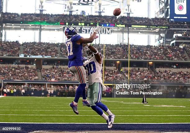 Sterling Shepard of the New York Giants makes a leaping touchdown catch over Anthony Brown of the Dallas Cowboys during the second quarter at AT&T...