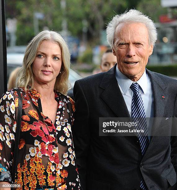 Director Clint Eastwood and Christina Sandera attend a screening of "Sully" at Directors Guild Of America on September 8, 2016 in Los Angeles,...