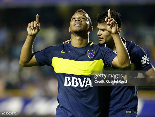 Frank Fabra of Boca Juniors celebrates with teammate Walter Bou after scoring the third goal of his team during a match between Boca Juniors and...