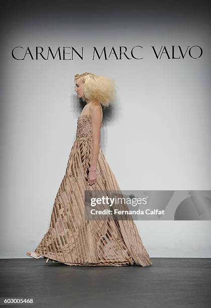 Model walks the runway at the Carmen Marc Valvo Spring/Summer 2017 Fashion Show during New York Fashion Week at Pier 59 Studios on September 11, 2016...