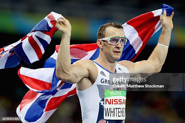 Richard Whitehead of Great Britain celebrates winning the men's 200 meter T42 final at Olympic Stadium during day 4 of the Rio 2016 Paralympic Games...