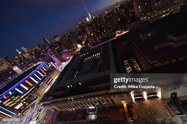 View of the "Tribute in Light" for the 15th anniversary of 9/11 during New York Fashion Week: The Shows at Skylight at Moynihan Station on September...