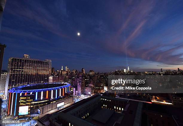 View of the "Tribute in Light" for the 15th anniversary of 9/11 during New York Fashion Week: The Shows at Skylight at Moynihan Station on September...