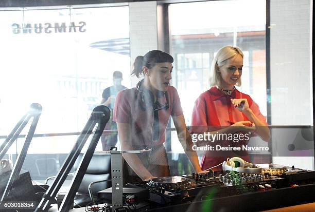 DJs Mia Moretti and Caitlin Moe attend the Timo Weiland Presentation during New York Fashion Week September 2016 at Samsung 837 on September 11, 2016...