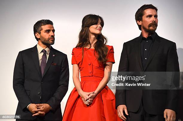 Actors Oscar Isaac, Charlotte Le Bon and Christian Bale attend the "The Promise" premiere during the 2016 Toronto International Film Festival at Roy...