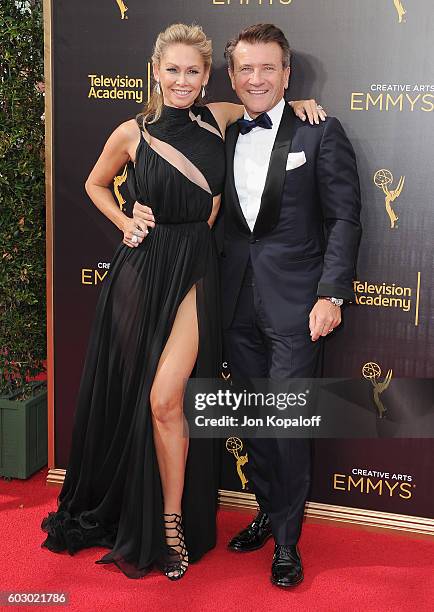 Kym Johnson and husband Robert Herjavec arrive at the 2016 Creative Arts Emmy Awards at Microsoft Theater on September 11, 2016 in Los Angeles,...