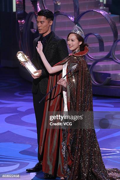 Champions Jackson Lai and Crystal Fung pose during the Mr. And Miss Hong Kong Pageants 2016 at TVB City on September 11, 2016 in Hong Kong, China.