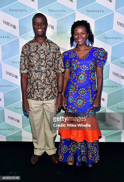 Robert Katende and Sarah Katende attend the Vanity Fair and Tiffany & Co. Private dinner toasting Lupita Nyong'o and celebrating Legendary Style at...