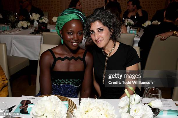 Actress Lupita Nyong'o and Global Creative Director Marketing Tiffany & Co. Toni Lakis attend the Vanity Fair and Tiffany & Co. Private dinner...