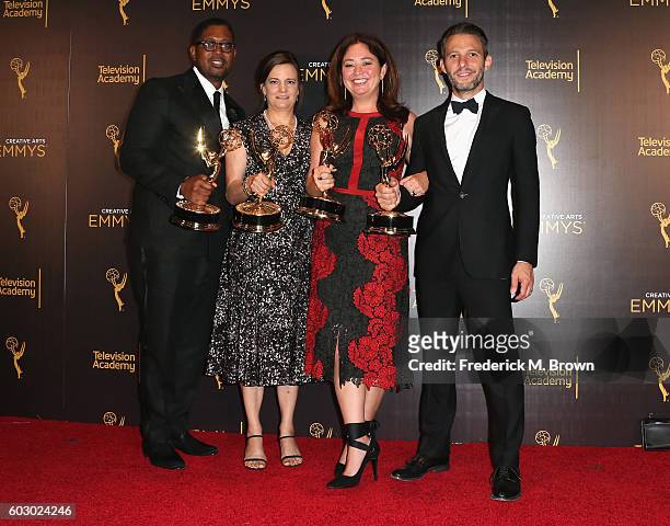 Producers of What Happened, Miss Simone?, winners of Outstanding Documentary Or Nonfiction Special, pose in the press room during the 2016 Creative...