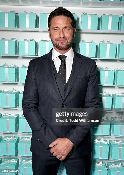 Actor Gerard Butler attends the Vanity Fair and Tiffany & Co. Private dinner toasting Lupita Nyong'o and celebrating Legendary Style at Shangri-La...