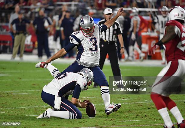 Stephen Gostkowski of the New England Patriots kicks a 47 yard field goal out of a hold by teammate Ryan Allen against the Arizona Cardinals at...