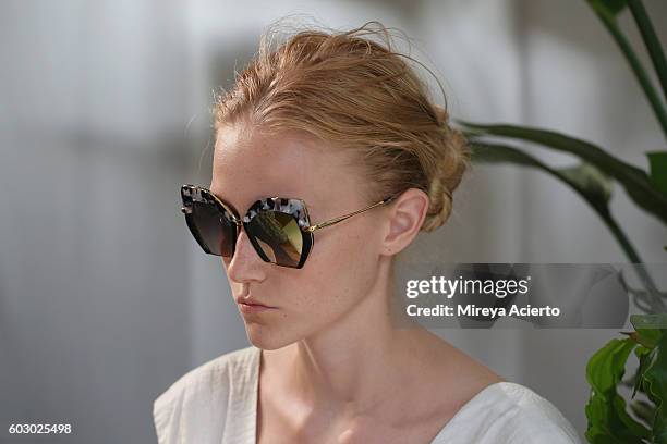 Model poses at the Krewe New Orleans Eyewear presentation during MADE Fashion Week September 2016 at Milk Studios on September 11, 2016 in New York...