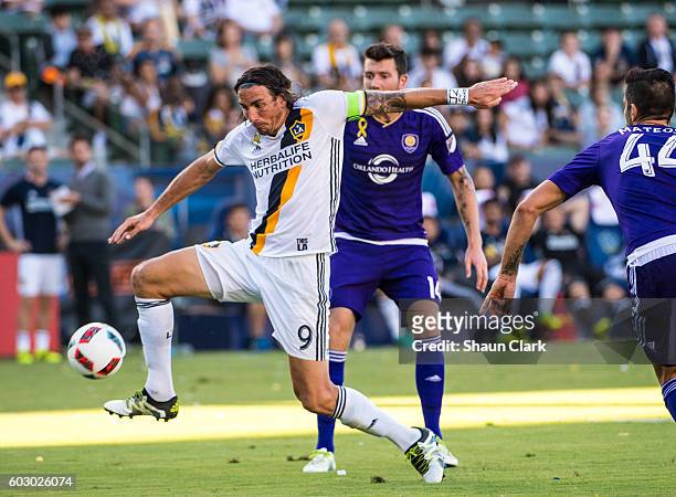Alan Gordon of Los Angeles Galaxy breaks in on goal during Los Angeles Galaxy's MLS match against Orlando City SC at the StubHub Center on September...