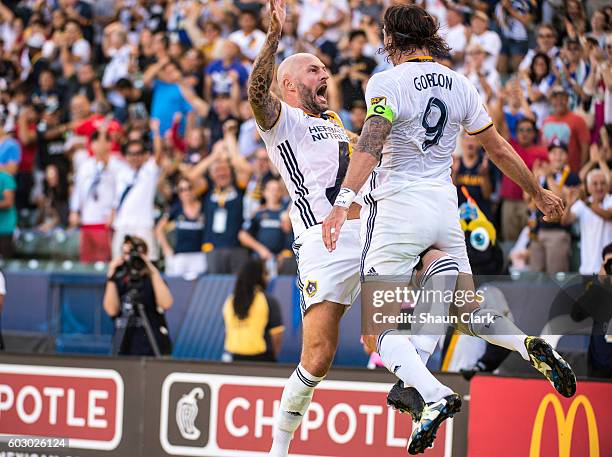 Alan Gordon of Los Angeles Galaxy celebrates his a goal with Jelle Van Damme of Los Angeles Galaxyduring Los Angeles Galaxy's MLS match against...