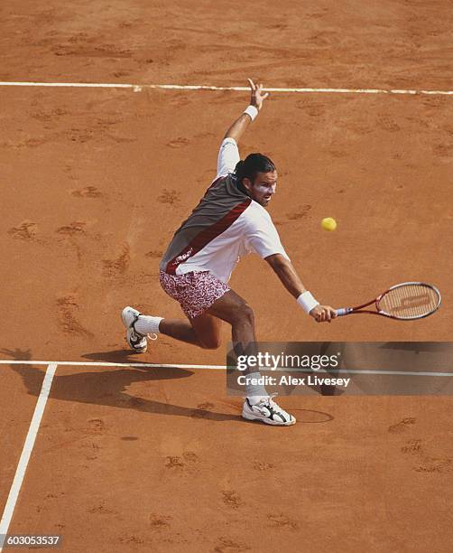 Patrick Rafter of Australia returns against Gustavo Kuerten during their Men's Singles Final match at the Italian Open Tennis Championship on 16 May...