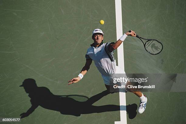 Guy Forget of France serves to Felix Mantilla Botella during their Men's Singles second round match of the United States Open Tennis Championship on...