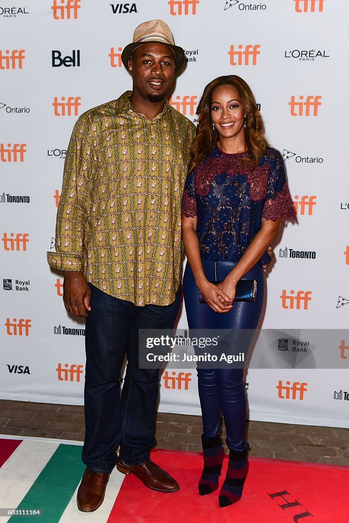 Former Boxing Champion Lennox Lewis and wife Violet Chang attend the