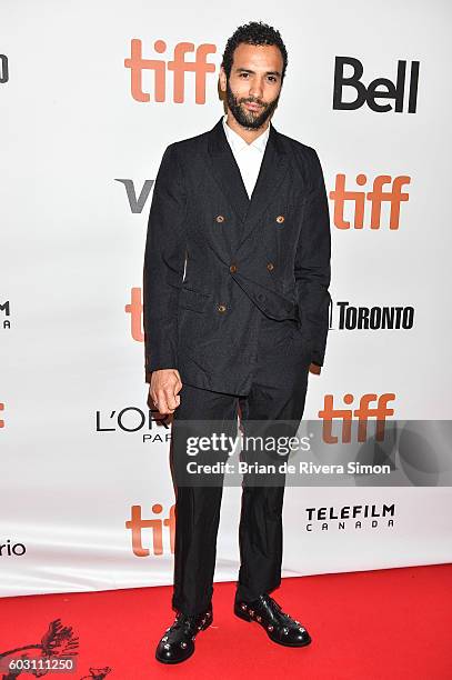 Actor Marwin Kenzari attends "The Promise" premiere during 2016 Toronto International Film Festival at Roy Thomson Hall on September 11, 2016 in...