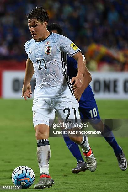 Gotoku Sakai of Japan competes for the ball during the 2018 FIFA World Cup Qualifier between Thailand and Japan at the Rajamangala National Stadium...