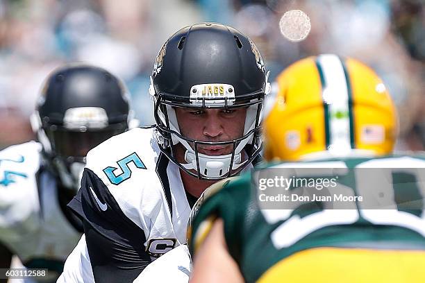 Quarterback Blake Bortles of the Jacksonville Jaguars at the line of scrimmage during the game against the Green Bay Packers at EverBank Field on...