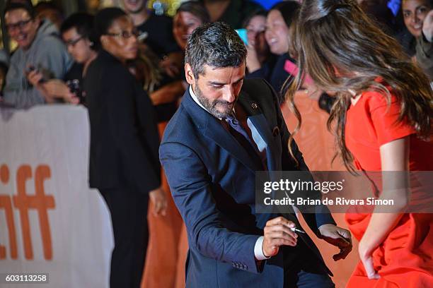 Actors Oscar Isaac and Charlotte Le Bon attend "The Promise" premiere during 2016 Toronto International Film Festival at Roy Thomson Hall on...