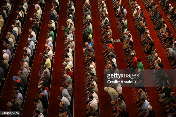 Muslims perform Eid Al-Adha prayer at Kocatepe Mosque in Ankara, Turkey on September 12, 2016. Muslims worldwide celebrate Eid Al-Adha, to...