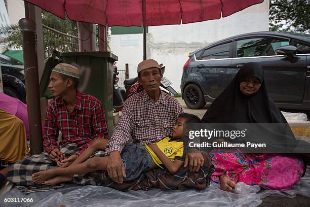 Thai muslims wait for donation outside the Haroon Mosque during Eid Al-Adha Festival. Muslims are celebrating Eid Al-Adha also called Sacrifice Feast...