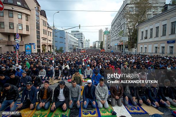 Muslims attend a morning prayer to mark Eid al-Adha in Moscow on September 12, 2016. Muslims are celebrating Eid al-Adha , the second of two Islamic...