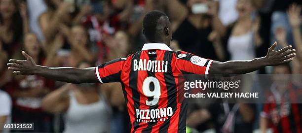 Nice's Italian forward Mario Balotelli celebrates after scoring a goal during the French L1 football match Nice vs Marseille on September 11, 2016 at...