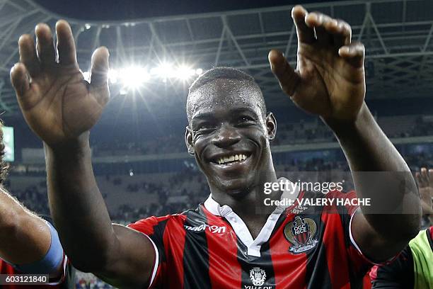 Nice's Italian forward Mario Balotelli celebrates at the end of the French L1 football match Nice vs Marseille on September 11, 2016 at the "Allianz...