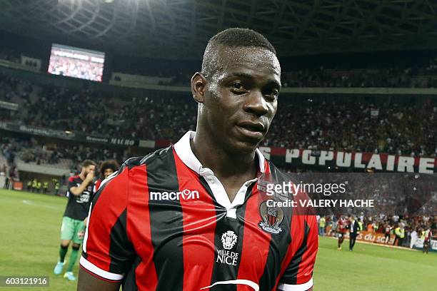 Nice's Italian forward Mario Balotelli looks on at the end of the French L1 football match Nice vs Marseille on September 11, 2016 at the Allianz...