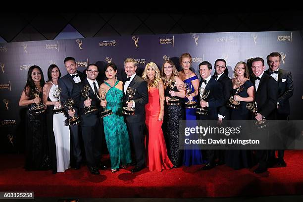 Cast and crew of Shark Tank, winner of Structured Reality Program, pose in the 2016 Creative Arts Emmy Awards Press Room Day 2 at the Microsoft...
