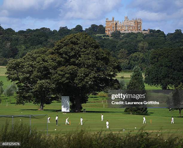 Children play a game of Cricket at the foot of Belvoir Castle at Belvoir Cricket Club on September 11, 2016 in Knipton, England.