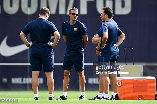 Head coach Luis Enrique of FC Barcelona looks on during a training session ahead of their UEFA Champions League Group C match against Celtic FC at...