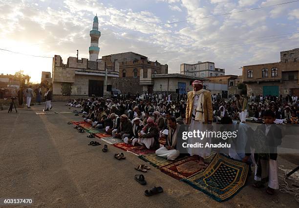 Muslims arrive to perform the Eid Al-Adha prayer at Al-Jaraf Square in Sanaa, Yemen on September 12, 2016. Muslims worldwide celebrate Eid Al-Adha,...