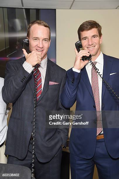Peyton Manning and Eli Manning attend Annual Charity Day hosted by Cantor Fitzgerald, BGC and GFI at BGC Partners, INC on September 12, 2016 in New...