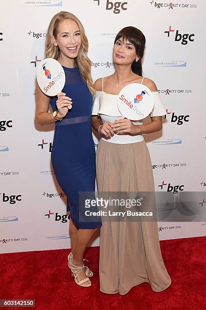 Miss USA 2015 Olivia Jordan and Miss Universe 2016 Pia Alonzo Wurtzbach attend Annual Charity Day hosted by Cantor Fitzgerald, BGC and GFI at BGC...