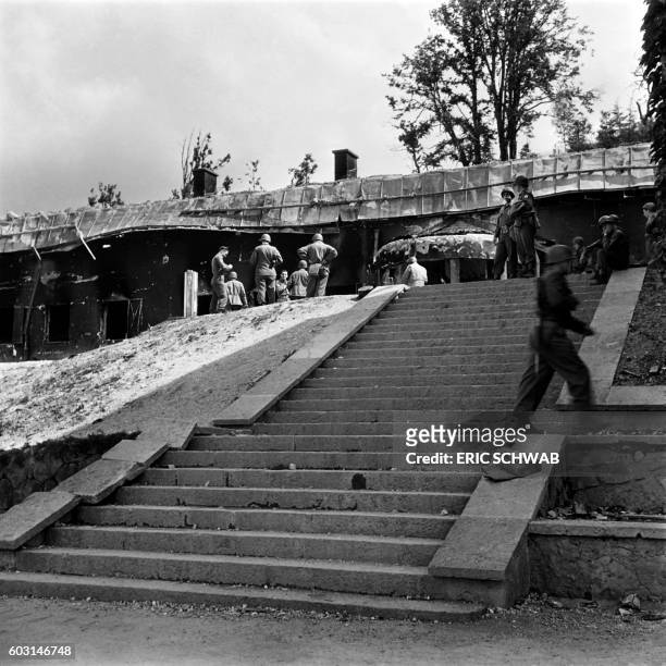 Photo taken on May 4, 1945 shows US soldiers in front of the Berghof, Adolf Hitler's home, in the Obersalzberg of the Bavarian Alps near...